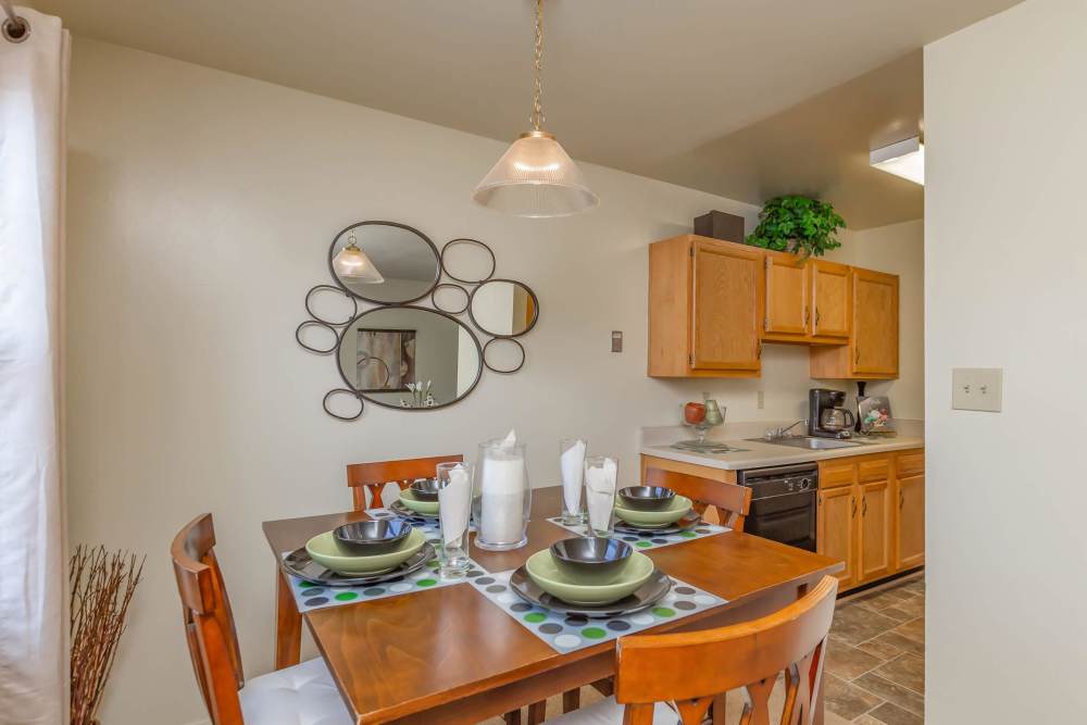 A dinning room with access to kitchen at Village at Town Park in Hampton, Virginia