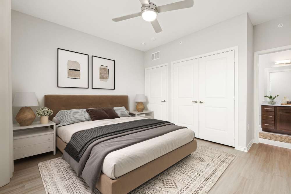 Cozy bedroom with a ceiling fan at Emerald Place in Lancaster, Ohio