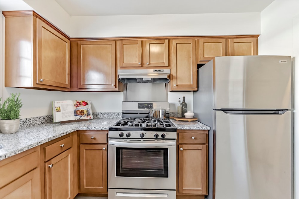 Kitchen with stainless-steel appliances at Lake Shore Park Apartments in Watervliet, New York