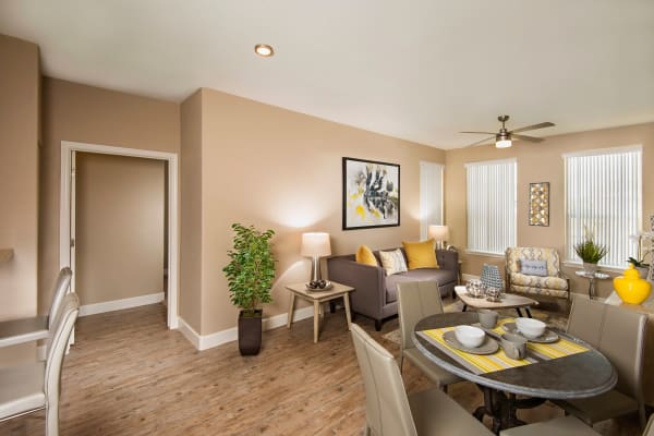 Luxury living room layout with autumn-toned furniture at Southern Avenue Villas