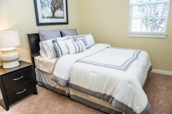 Bedroom with carpet at Traditions at Westmoore in Oklahoma City, Oklahoma