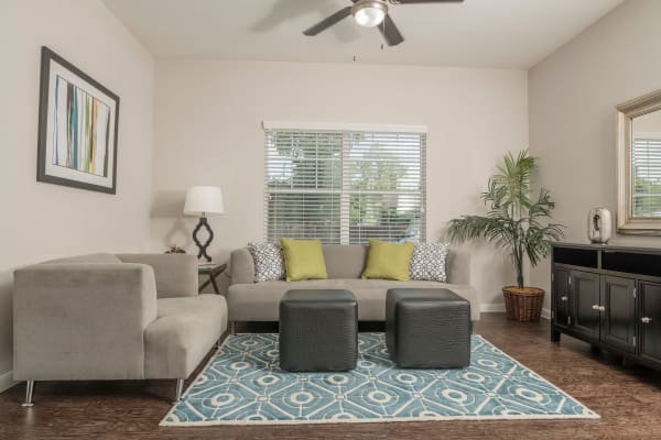 Natrually well-lit living room at Cambria Cove Apartments in Houston, Texas