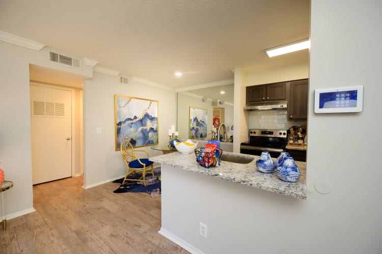 Open-concept model home with wood-style flooring at The Hamilton in Hendersonville, Tennessee