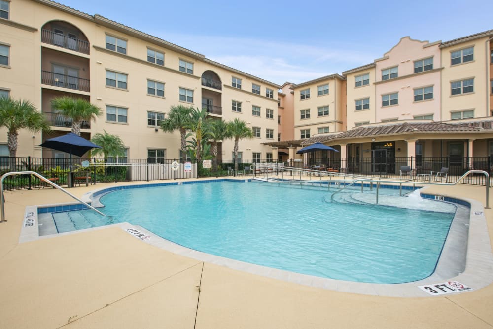 large pool at Merrill Gardens at Solivita Marketplace in Kissimmee, Florida. 