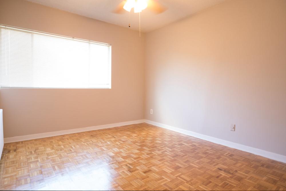 Spacious living area with natural lighting at Central Gardens in Memphis, Tennessee