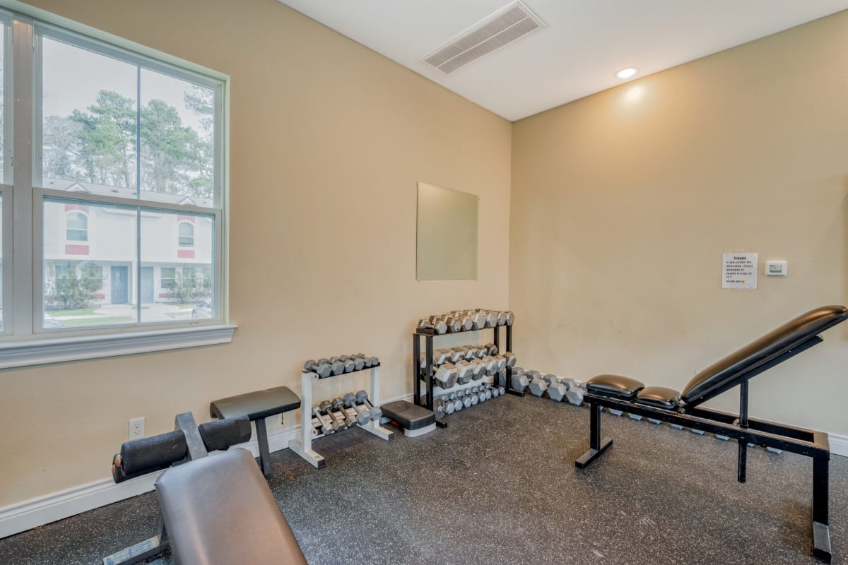 Inside the fitness center at Huntsville Village Apartments in Huntsville, Texas