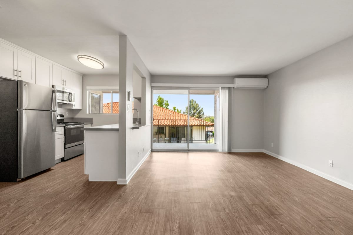 Apartment with wood-style floor at Los Robles Apartments, Thousand Oaks, California