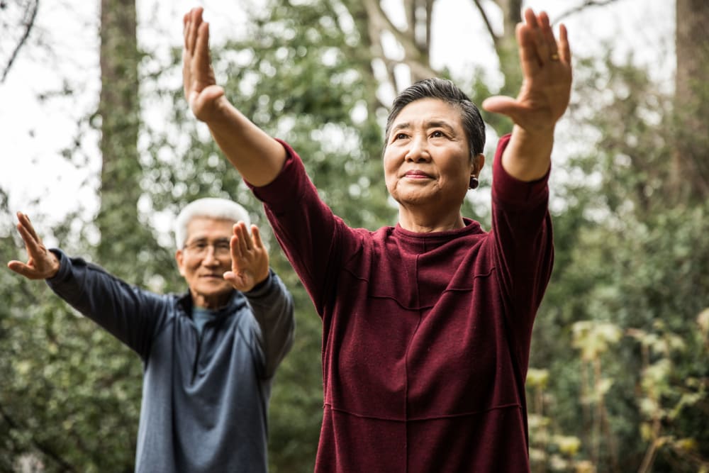 Residents practicing yoga at Mariposa at Western Heights in Dallas, Texas