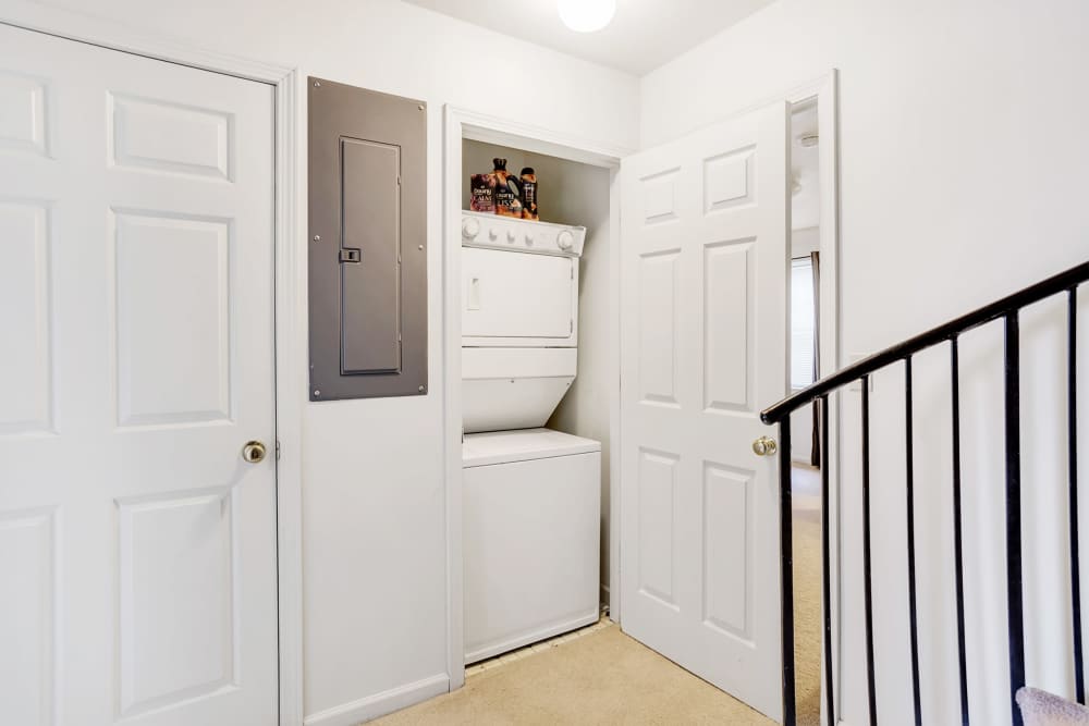 Stacked washer and dryer in the apartment at Traverse Commons in Indiana, Pennsylvania