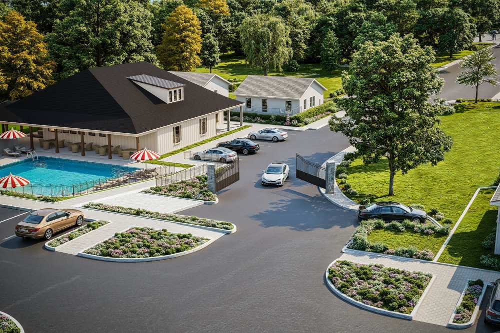 Gated entrance with landscaped pool area at Russ Town Crossing in Ruston, Louisiana
