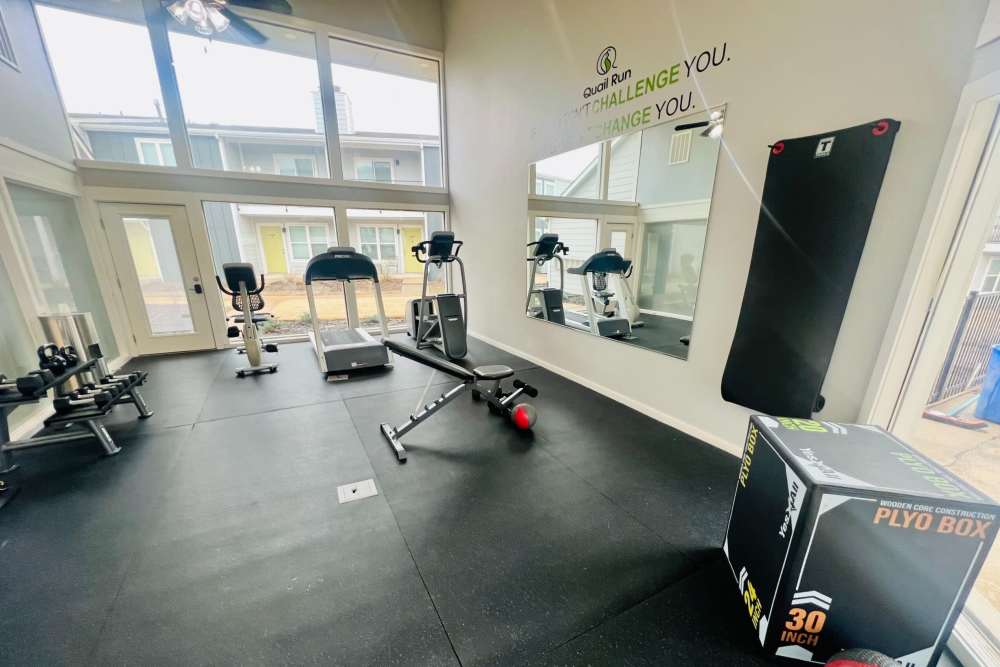 Fitness center with full height window at Quail Run in Oklahoma City, Oklahoma