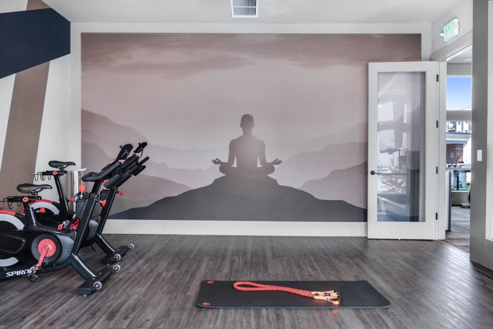 Fitness center with cycling equipment at Flats on the A in Aurora, Colorado