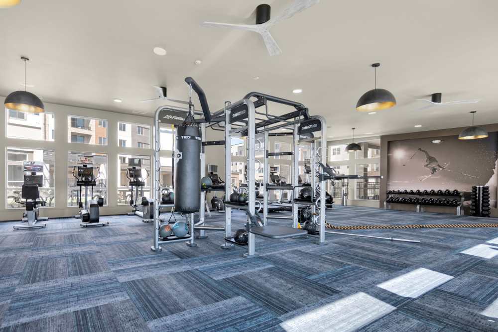 Spacious gym with large windows at Flats on the A in Aurora, Colorado
