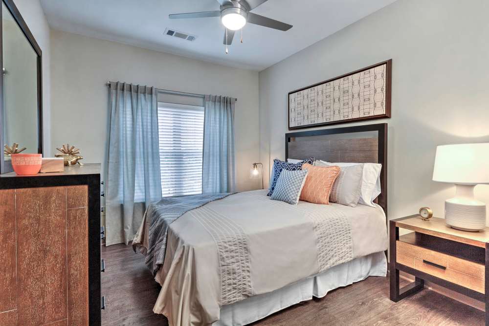 Bedroom with lamp at Cedar Flats in Charlotte, North Carolina