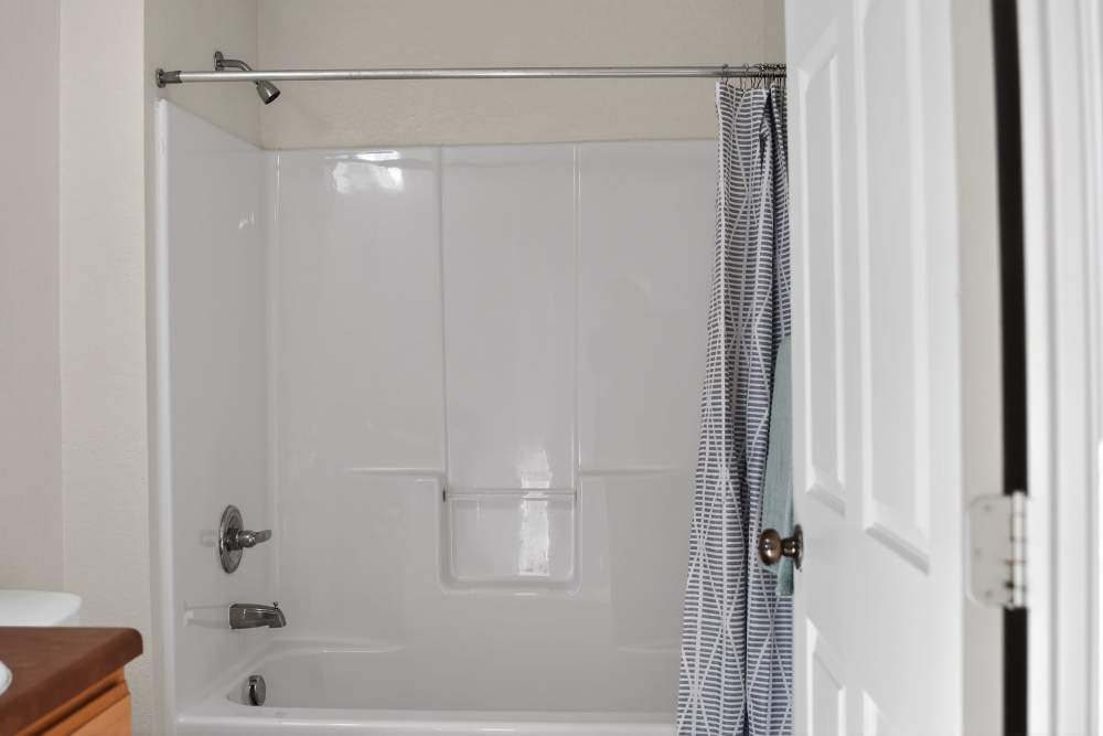 Bathtub in the bathroom at Lakeside in Mt Pleasant, Texas