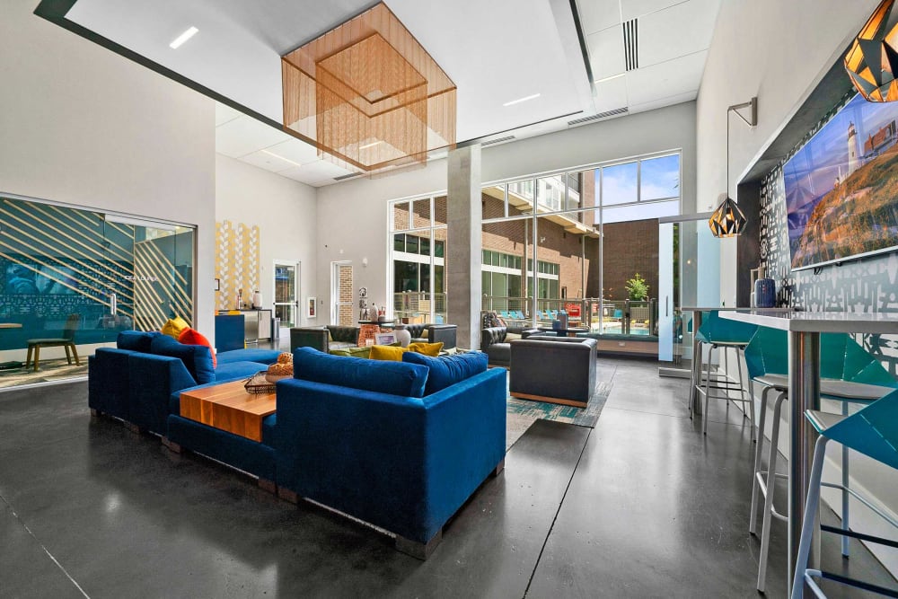Stunning resident clubroom with eclectic modern furnishings at EDGE on the Beltline in Atlanta, Georgia