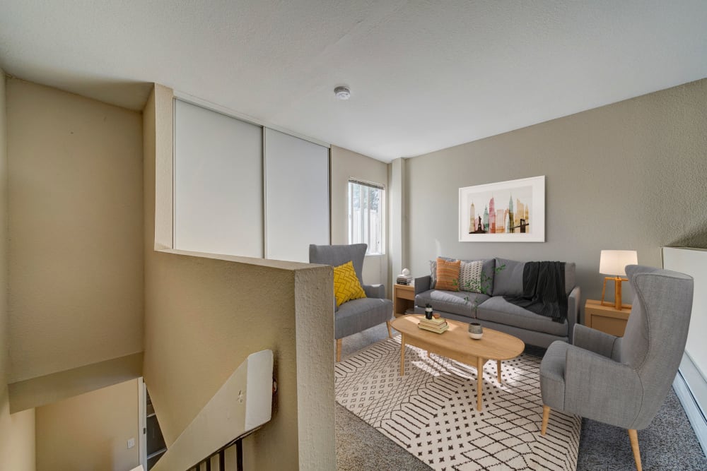 Upstairs loft living room area at The Timbers Apartments in Hayward, California