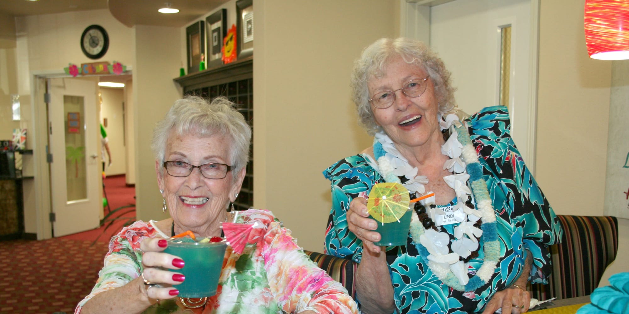 Two residents having drinks at Northridge Gracious Retirement Living in Fishers, Indiana