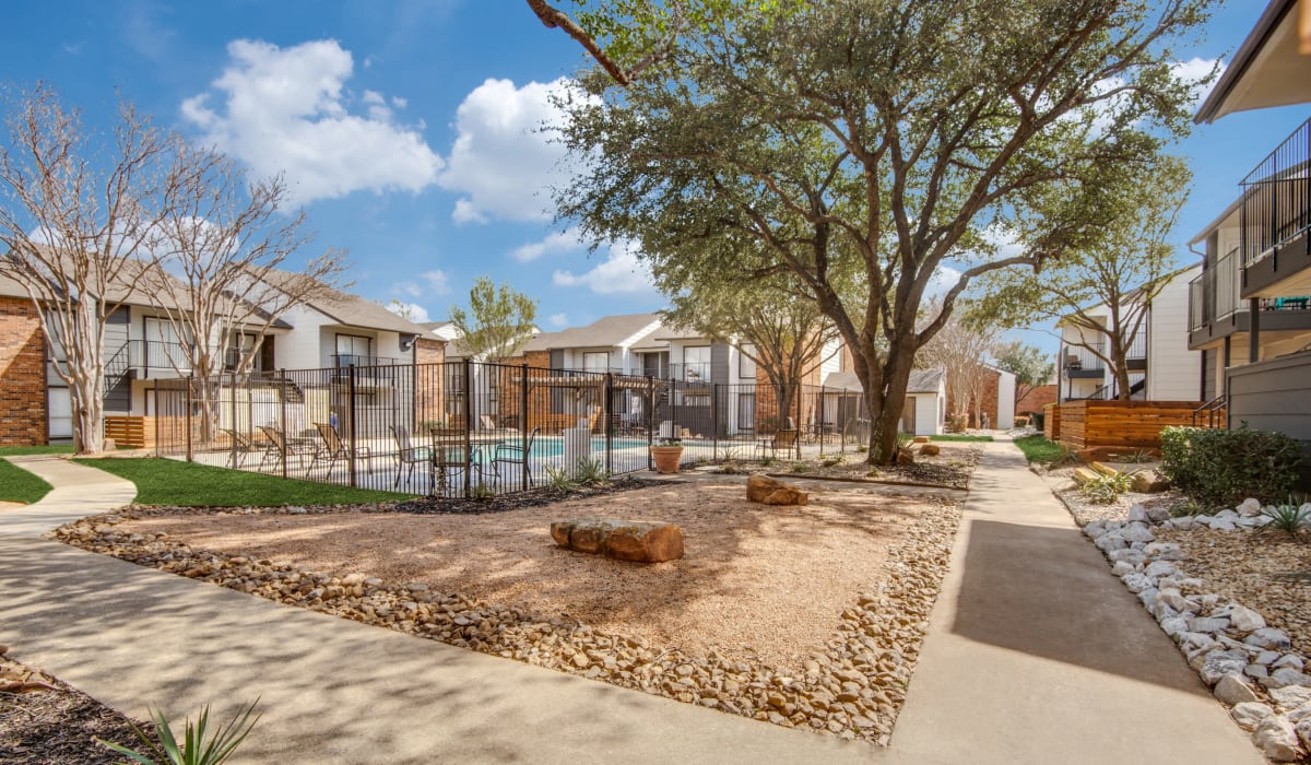 Pool in the center of the complex at Holbrook Apartment Homes in Dallas, Texas