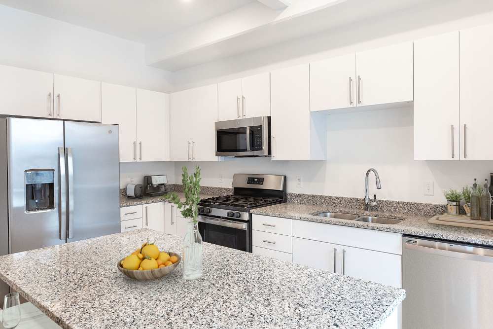 Kitchen with White Cabinetry at The Hardison in Salt Lake City, Utah