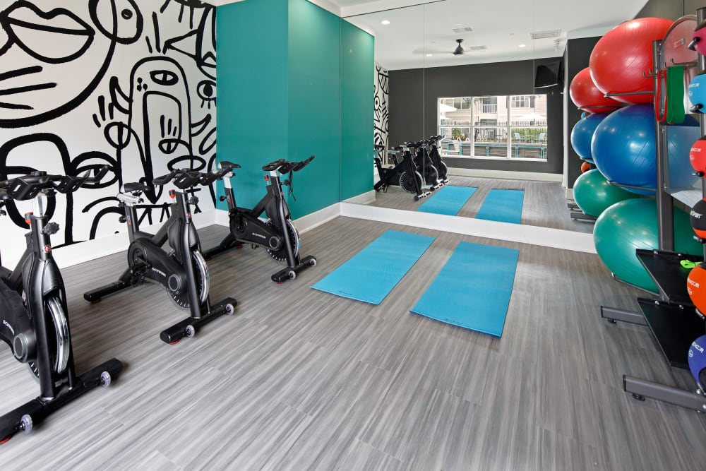 Yoga and spin room in the fitness center at Amira at Westly in Tampa, Florida