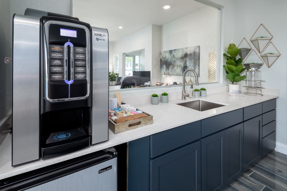 Clubhouse with coffee bar poolside at Verse at Royal Palm Beach in Royal Palm Beach, Florida