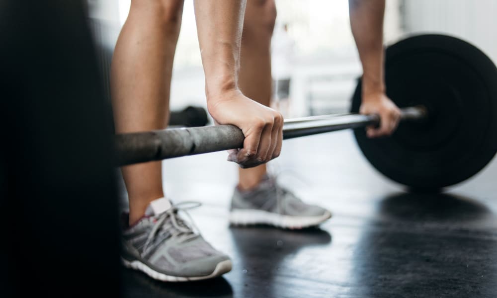 A resident lifting weights at Bellevue Mill in Hillsborough, North Carolina