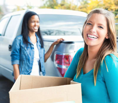 People with moving boxes arriving at Superior Storage in Edinburg, Texas