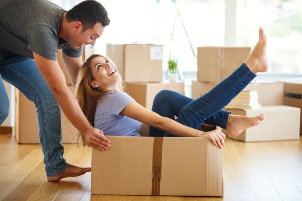 Couple moving boxes to store at Metro Self Storage in Mount Laurel, New Jersey