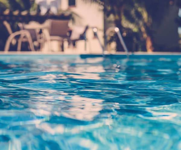 Relax in the sparkling pool at Vue Alameda