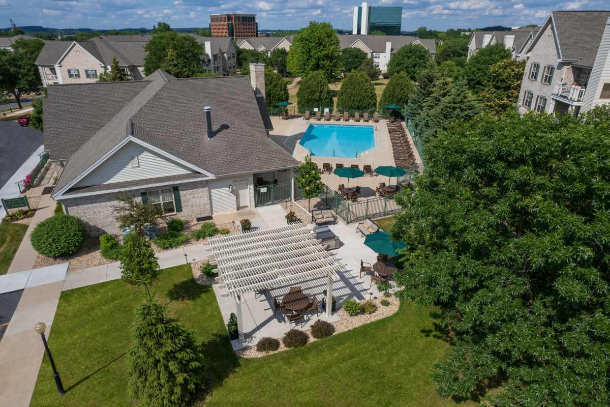 Outdoor kitchen with pool at Deer Creek in Middleton, Wisconsin