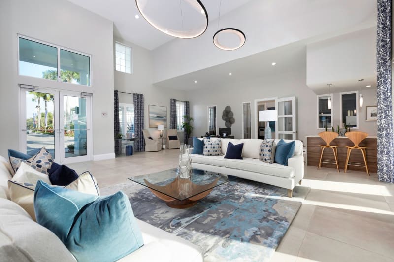 Bright and welcoming lobby interior with modern furnishings at High Ridge Landing in Boynton Beach, Florida