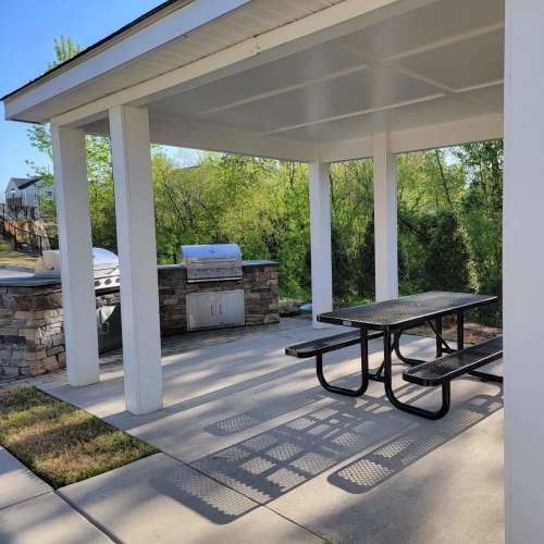 Outdoor barbeque area at Seasons at Poplar Tent in Concord, North Carolina