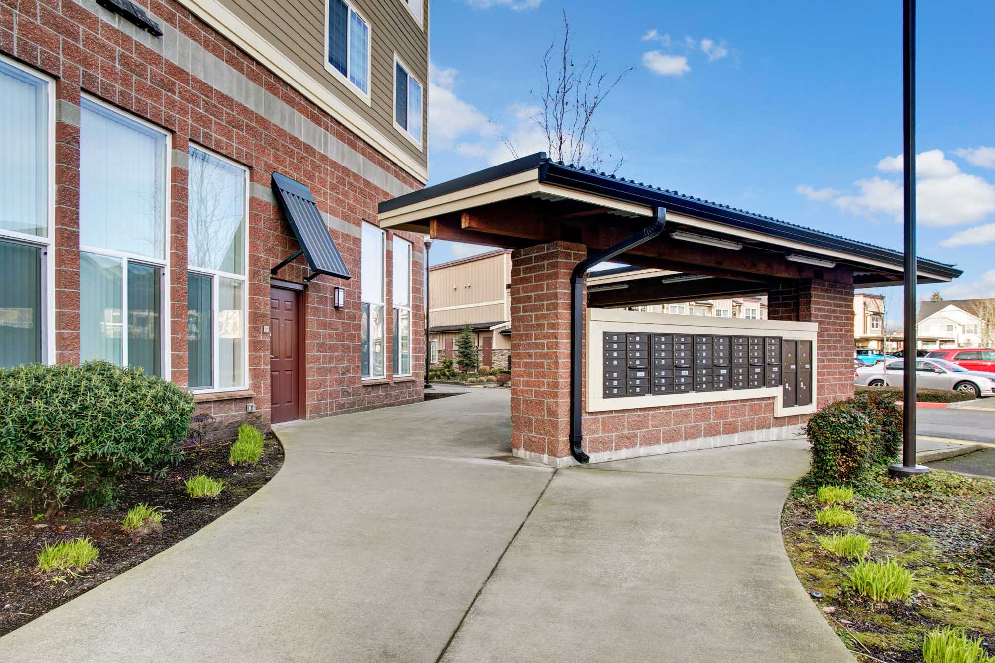Entrance of community apartment at Trax at Dupont Station in Dupont, Washington