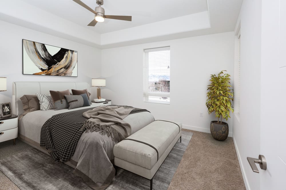 A furnished master bedroom at The Hardison in Salt Lake City, Utah