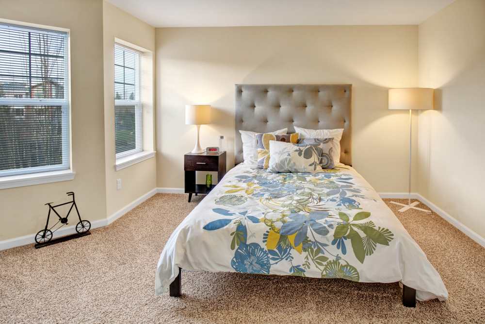 Bedroom with carpet flooring and window at Trax at Dupont Station in Dupont, Washington