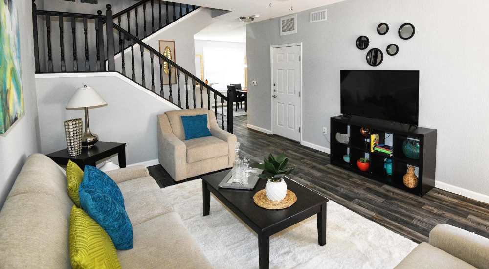 Model home's living space with stairs to the next level at Las Ventanas in Alamogordo, New Mexico