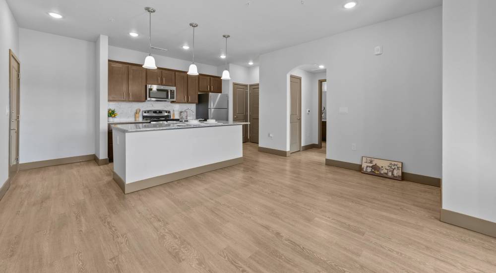 Fully equipped kitchen with connecting living room at Harvest Creek in Marshall, Texas