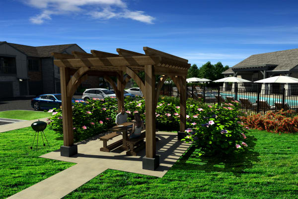 Couple enjoying some shade on a sunny day at Springs at McKinney in McKinney