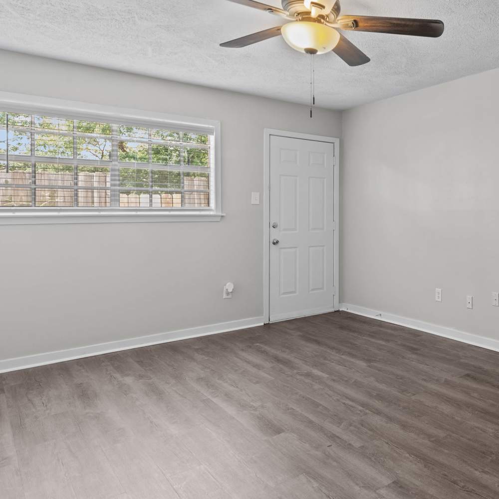 Charming bedroom with natural light and modern finishes at Pecan Ridge in Vicksburg, Mississippi.