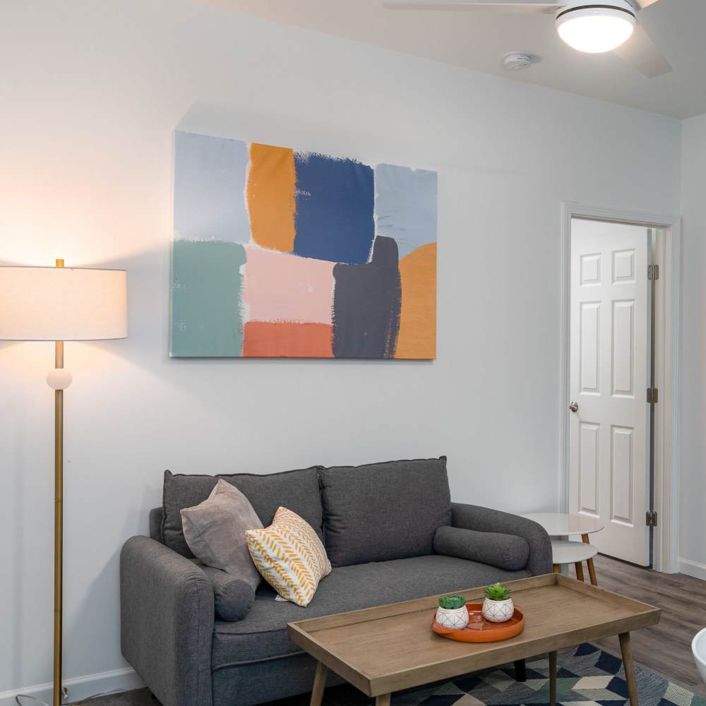 Couch and lamp in a living room at Park Canyon in Dalton, Georgia