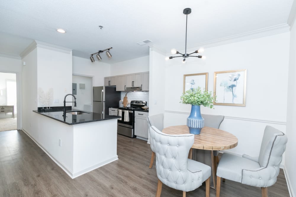 Model kitchen and dining area at Highland Square in Atlanta, Georgia