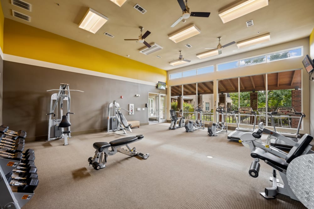 Assortment of exercise machines in the fitness center at The BLVD in San Angelo, Texas