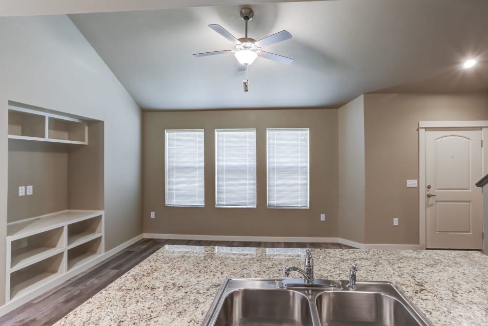 Granite countertops and spacious living room at Cedar Park & Canyon Falls Townhomes in Twin Falls, Idaho