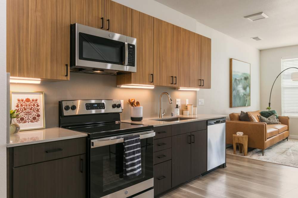 Kitchen and living areas of a model home at Olympus Latitude in Albuquerque, New Mexico