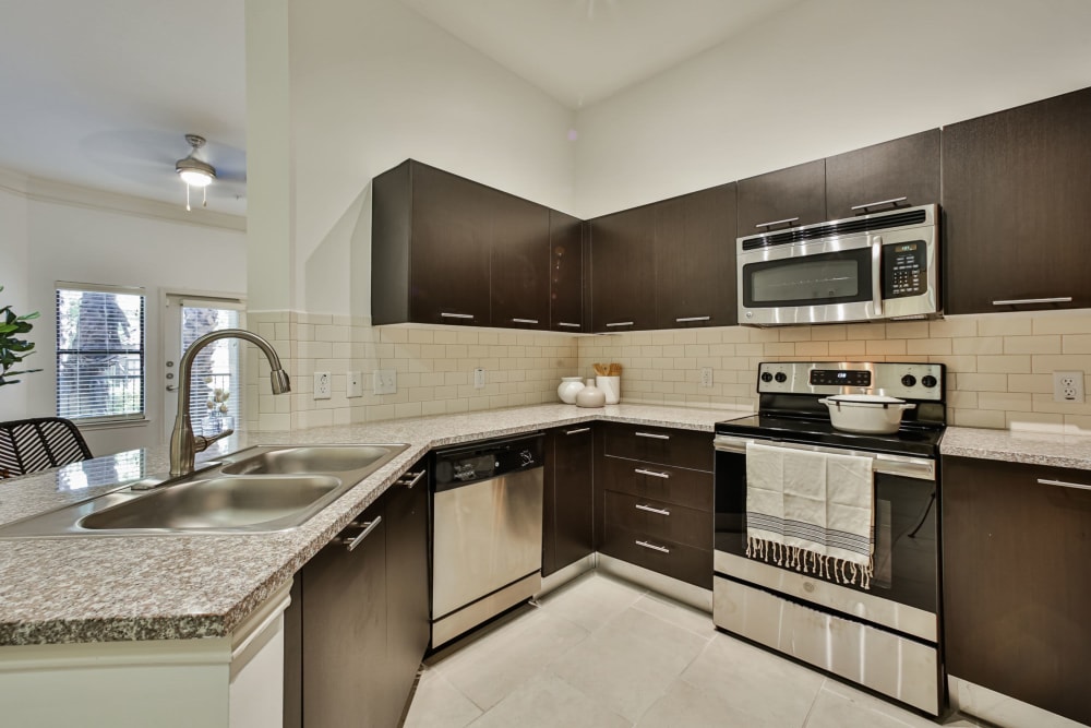 Granite countertops and vaulted ceilings at Broadstone Toscano in Houston, Texas