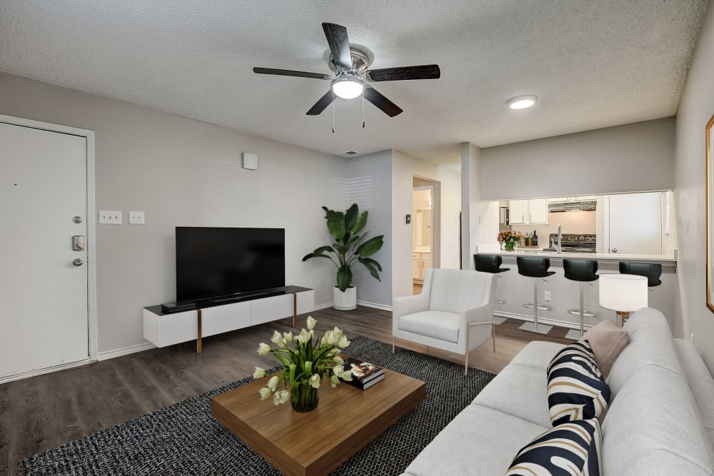 A welcoming apartment living room at Leander Apartment Homes in Benbrook, Texas