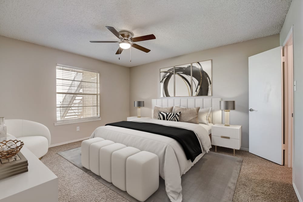 Beautiful white bedroom at Leander Apartment Homes in Benbrook, Texas