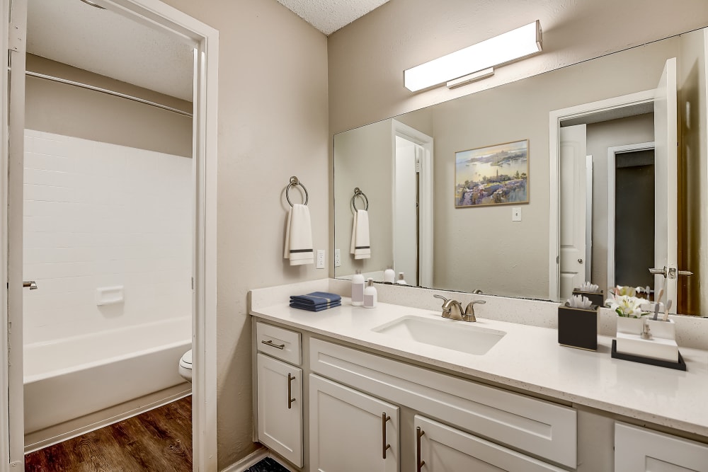Shining bathroom at Leander Apartment Homes in Benbrook, Texas