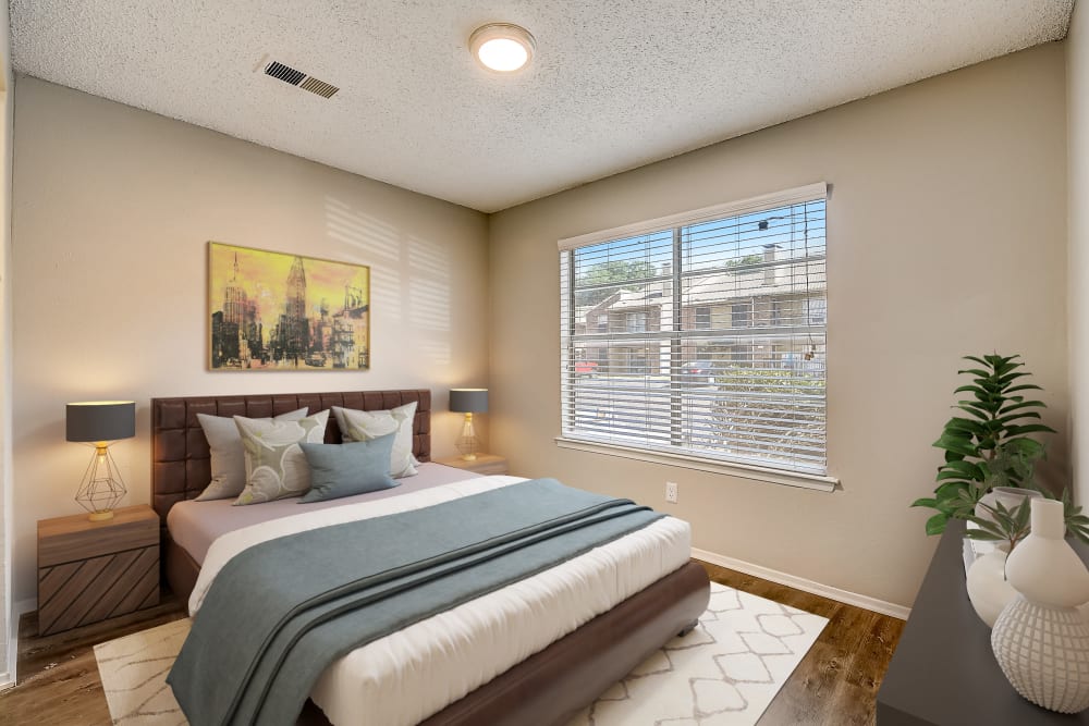 Cozy bedroom at Leander Apartment Homes in Benbrook, Texas